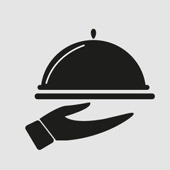 Fototapeta premium silhouette of serving dish in hand