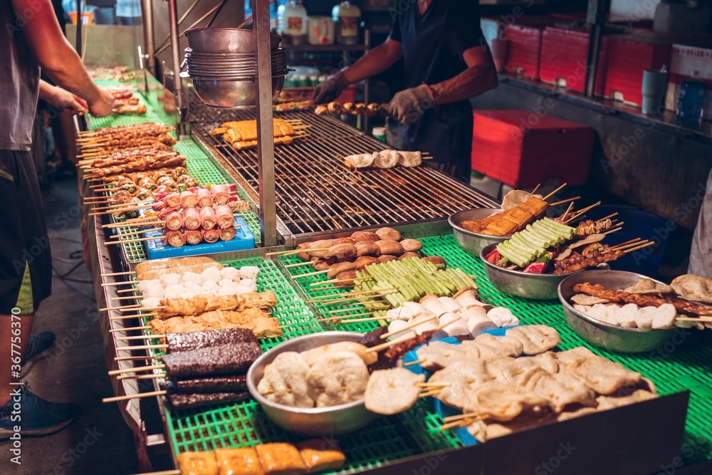 Poster closeup shot of traditional taiwanese barbecue in traditional night market in zhubei, taiwan