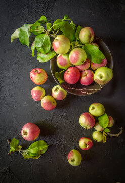 image of new crop apples on an old table