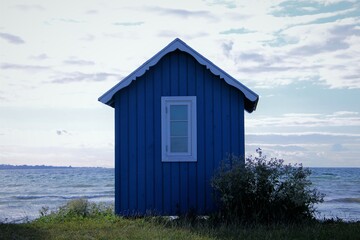 Blue beach hut on the beach