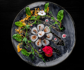 sushi roll with eel and rice in plate