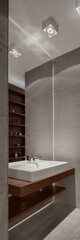 Fototapeta na wymiar Trendy bathroom with concrete tiles, vertical panorama