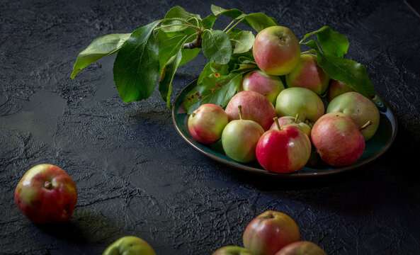 image of new crop apples on an old table