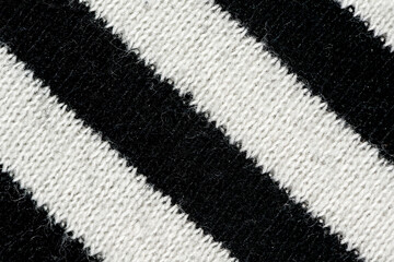 Black and white striped knitting wool texture background.