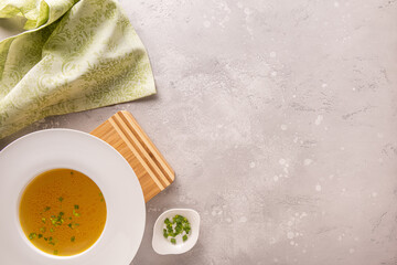 Flat lay with bouillon, napkin and copy space