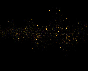 Sparkling golden magic light on black.