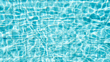 Surface blue water swimming pool with reflect of sun light