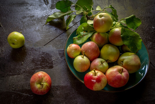 image of new crop apples on an old table