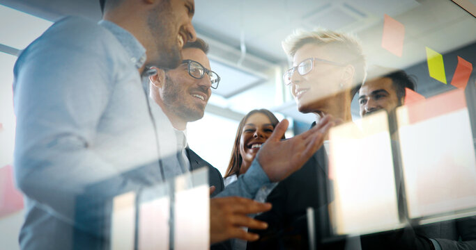 Creative business people working on business project in office