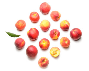 Many ripe peaches on light background