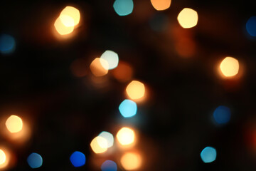 Blurred bokeh in warm colors. Lights and highlights for the background.
