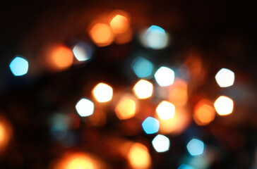 Blurred bokeh in warm colors. Lights and highlights for the background.