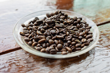 Coffee beans in a clear dish