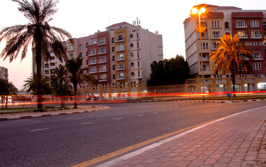 Light trails at dusk on road