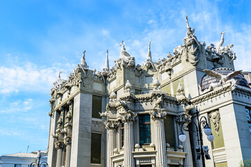 Fototapeta na wymiar House with chimeras in Kiev, Ukraine. Art Nouveau building with sculptures of the mythical animals was created by architect Vladislav Gorodetsky between 1901 and 1903.