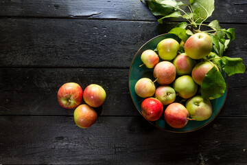 image of new crop apples on an old table