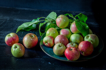 image of new crop apples on an old table