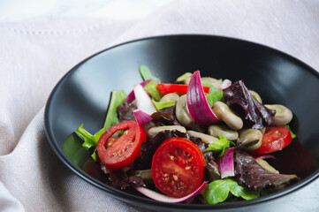 Salad tomato red onion vegetables diet, marble background