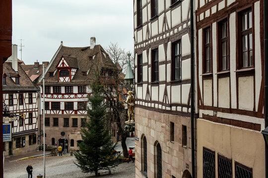 View of square Tiergaertnertorplatz with Pilatushaus building and Albrecht Duerer Haus, Nuremberg, Germany.