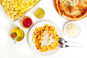 Assortment of Italian dishes on a white background