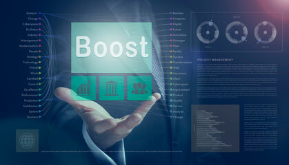 Businessman outreached hand holding a Boost business concept on a computerised screen display.