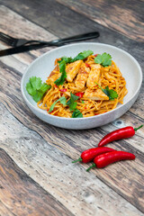 Vegetable noodles with chicken meat preparation