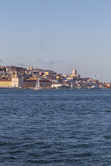 Fototapeta premium View of the historic waterfront of Lisbon from the Tejo river