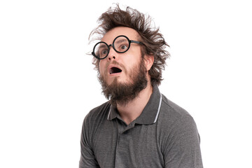 Fototapeta Crazy Scared or Shocked Bearded Man with funny Haircut in Eyeglasses looks Worried. Silly, Afraid or Surprised guy, isolated on white background. obraz