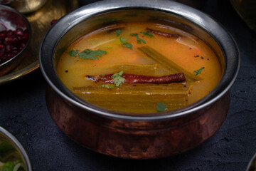 Indian sambar spicy stew made with moringa and lentils