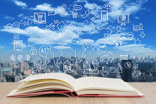 読書で学習する様々な知識・町並みと青空背景-スマホ・パソコン・ネットワーク・ビジネスのアイデア