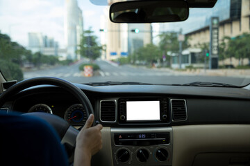 Driving car on city road awaiting in front of the zebra crossing