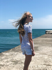 young woman walking on the beach