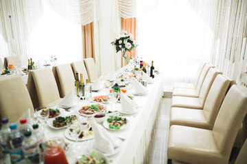 Interior of a restaurant prepared for wedding ceremony