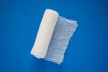 Medical bandage on blue background