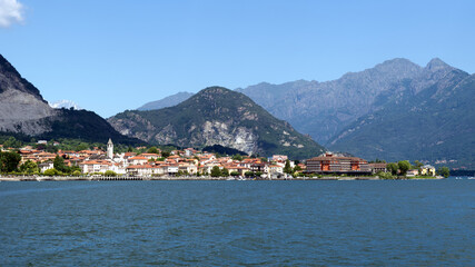 Fototapeta na wymiar View on Baveno Town in Italy. Lake and mountain. Lake Lago Maggiore in northern Italy. 
