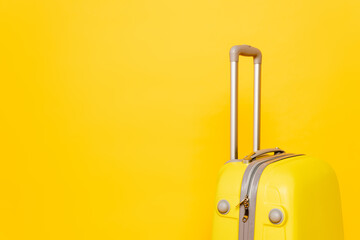 colorful travel bag on yellow background