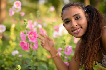 Young beautiful Asian woman relaxing at the park