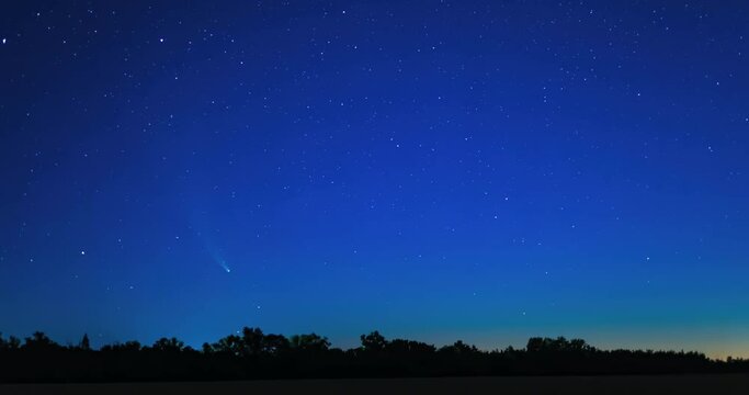 Comet NEOWISE moves across the starry night sky under the Constellation Ursa Major, becoming subtle in the predawn sky. Timelapse