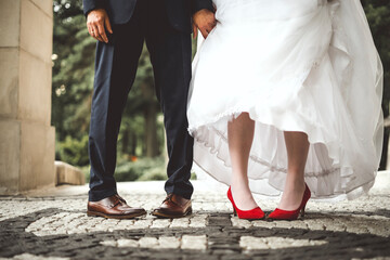 Bride's and groom's funny crossed legs
