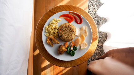Fried rice or Nasi Goreng with scrambled egg, chicken and shrimp