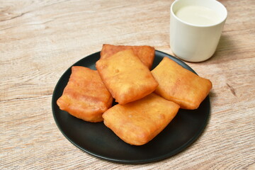 Chinese pastry dough on plate eating with soy milk cup 