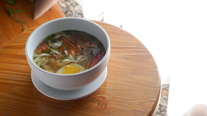 Chicken Soup or Sop Ayam, a typical Indonesian food for breakfast