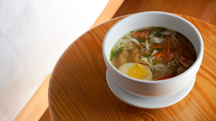 Chicken Soup or Sop Ayam, a typical Indonesian food for breakfast