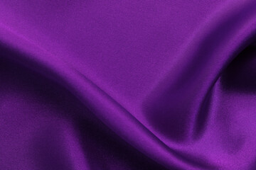 Purple fabric cloth texture for background and design art work, beautiful crumpled pattern of silk or linen.