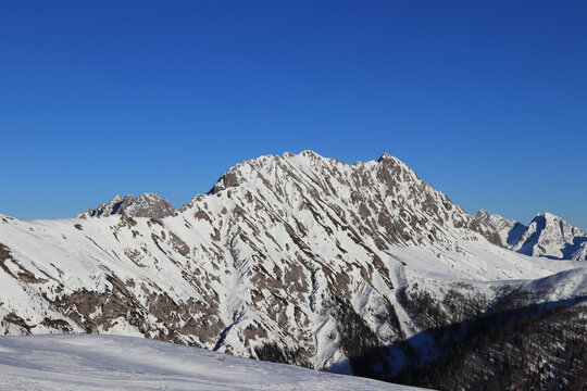 Magnificent views of the Tyrolean Alps in western Austria especially the rocky mountain Eggenkofel from the Obertilliach ski resort in the Lesachtal Valley. The slope is ideal for beginners