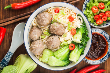 Chinese Food：Meatballs served with noodles,
