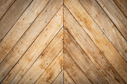 seamless brown color lumber in arrows or chevron pattern. top view