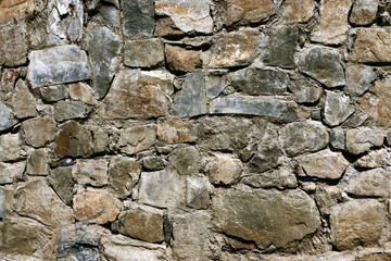 Stone wall background. Natural stones wall texture. Old castle stone wall texture background.
