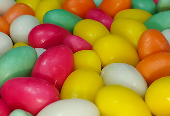 Fototapeta na wymiar candies of different colors in selective focus