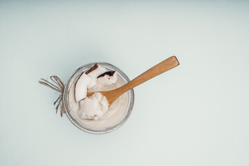 Parts of coconut on a colored background. Close up. Fresh ripe coconut broken into pieces. Coconut oil.